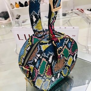 Anaïs Circle Clutch